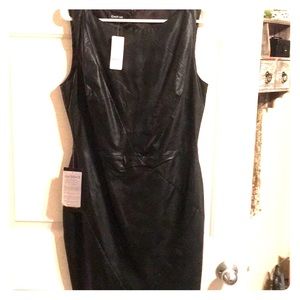 Black faux leather Bebe mini dress size 12